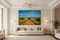 The Crossing of Giants — Elephant & Giraffes fine art print displayed in a grand luxury living room, warm white statement wall, no frame — Wild East Visuals