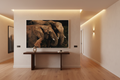 Shoulder to Shoulder — Two Elephant Heads fine art print displayed in a luxury hallway, warm wall, no frame — Wild East Visuals