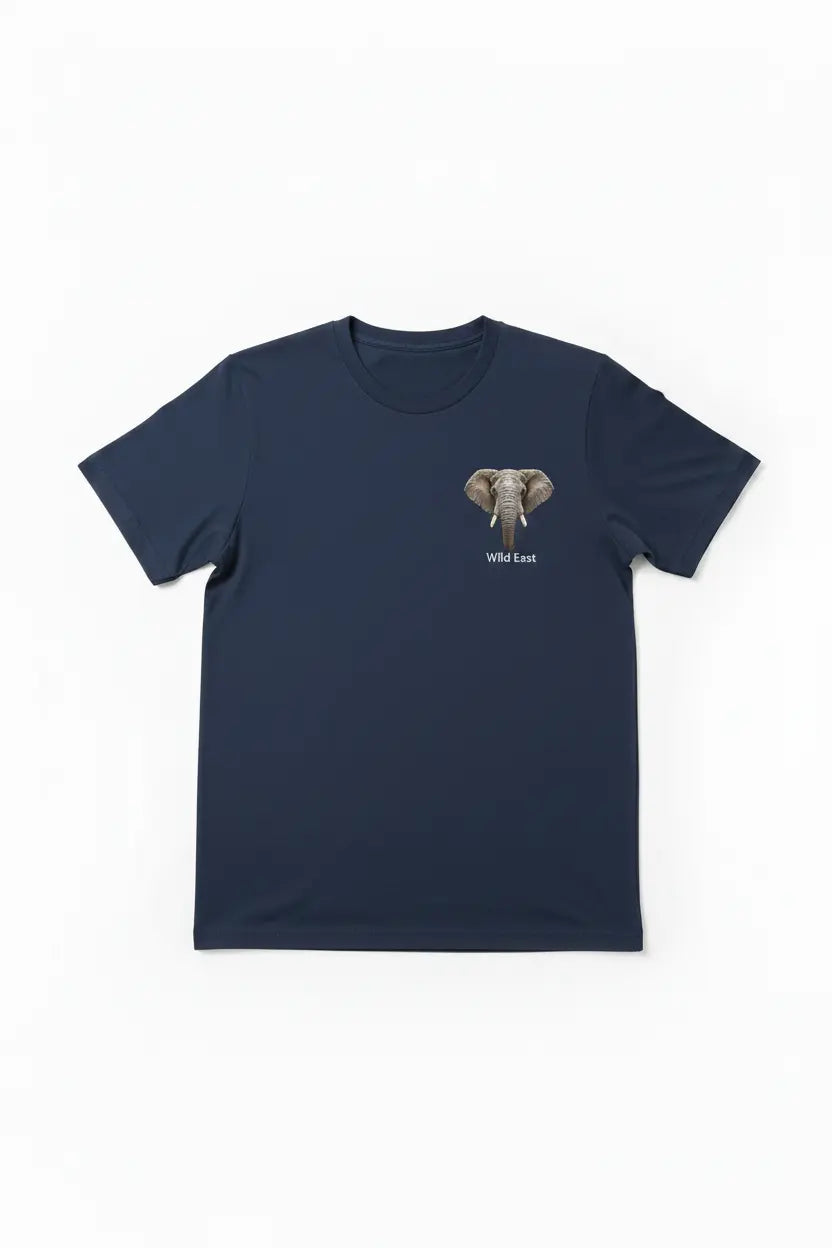 Wild East Navy Tee flat lay — elephant badge on left chest, 100% cotton, handcrafted in Nairobi — Wild East Visuals